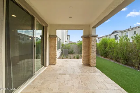 a view of a room with a large window