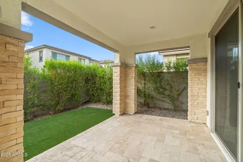 a view of backyard with green space