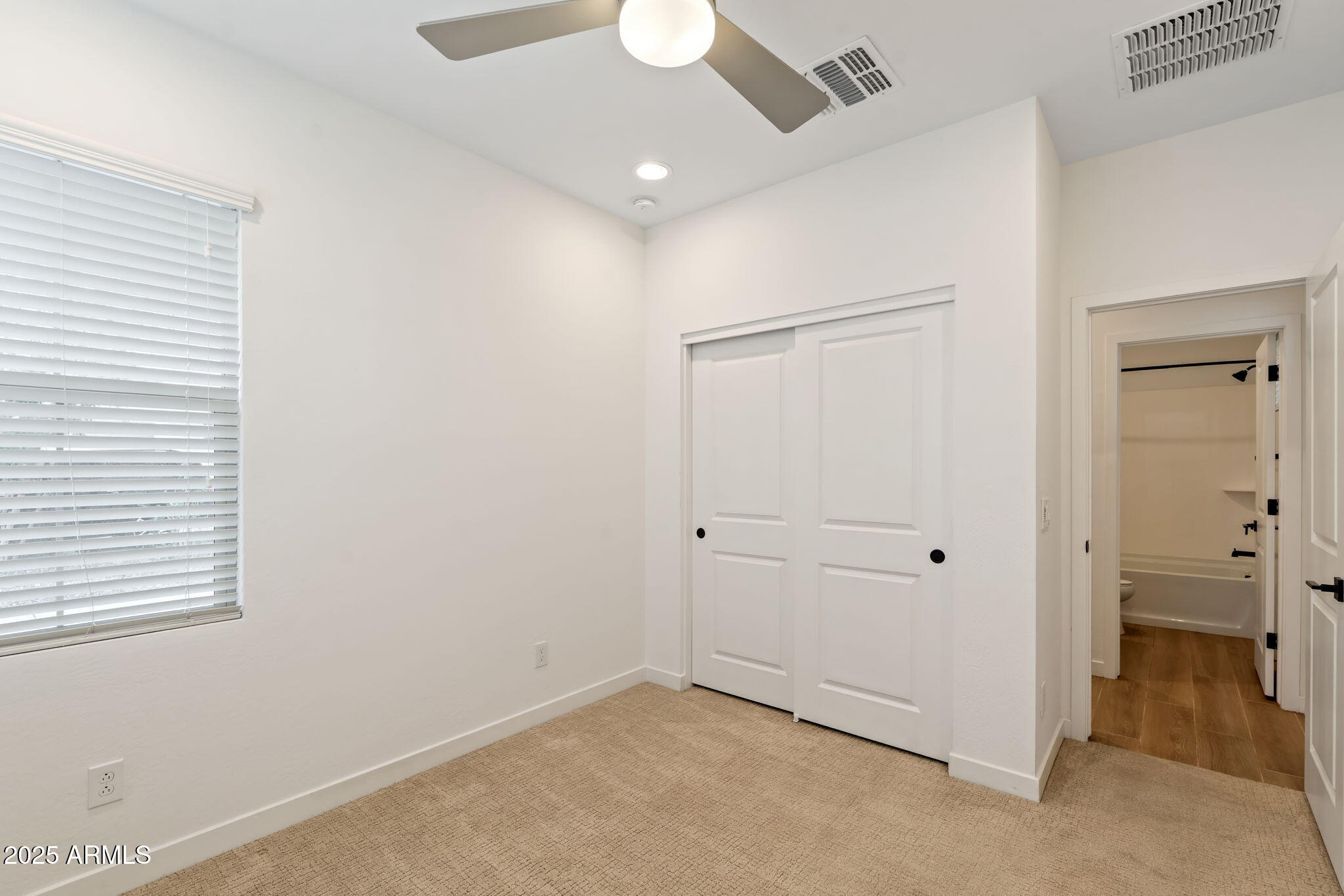 6428 North 17th Place Phoenix, AZ 85016 - Photo 21 of 48 a view of an empty room with a window