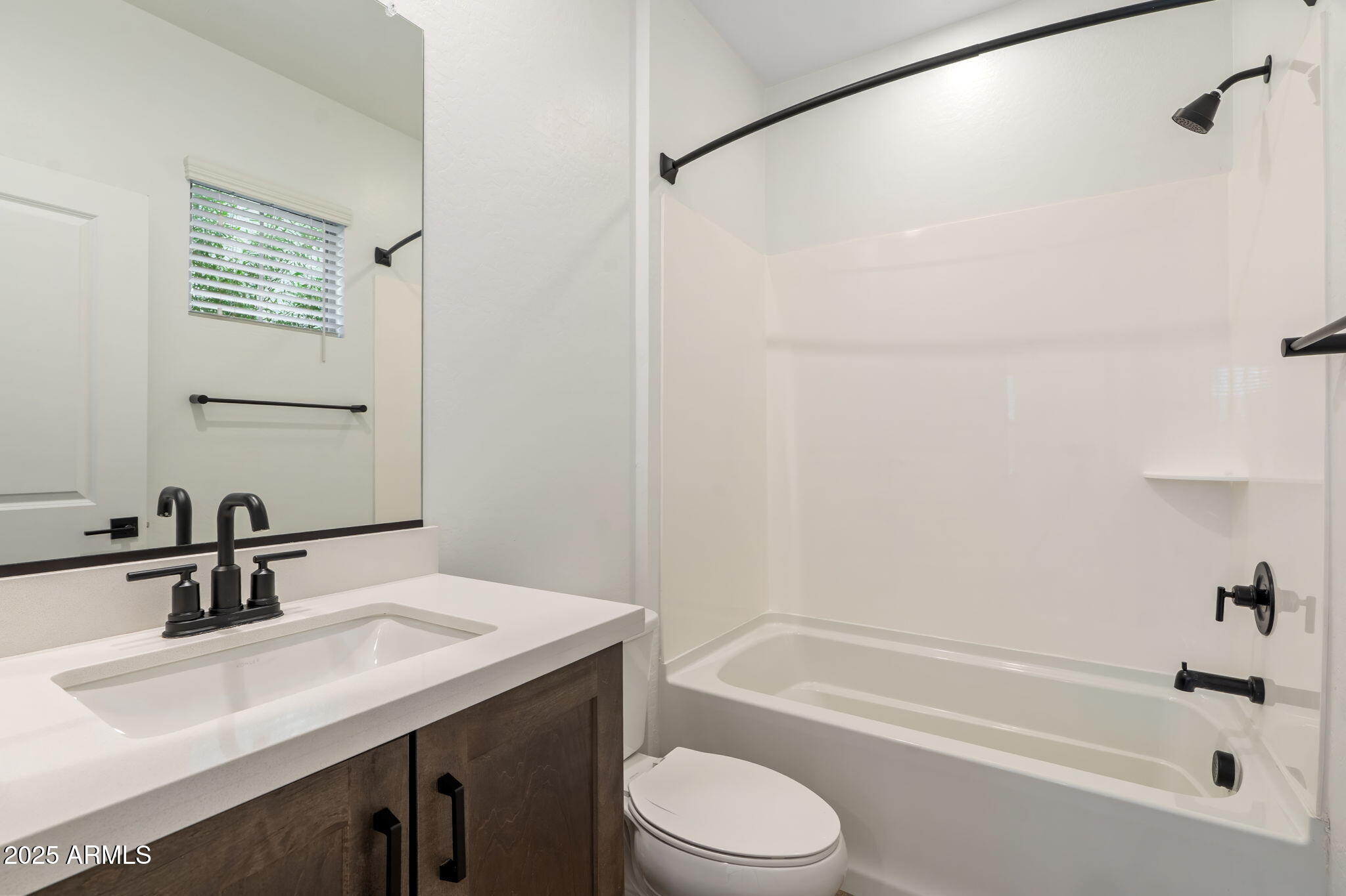 6428 North 17th Place Phoenix, AZ 85016 - Photo 22 of 48 a bathroom with a sink a toilet and shower