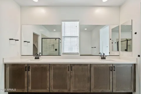 a bathroom with a bathtub and a sink