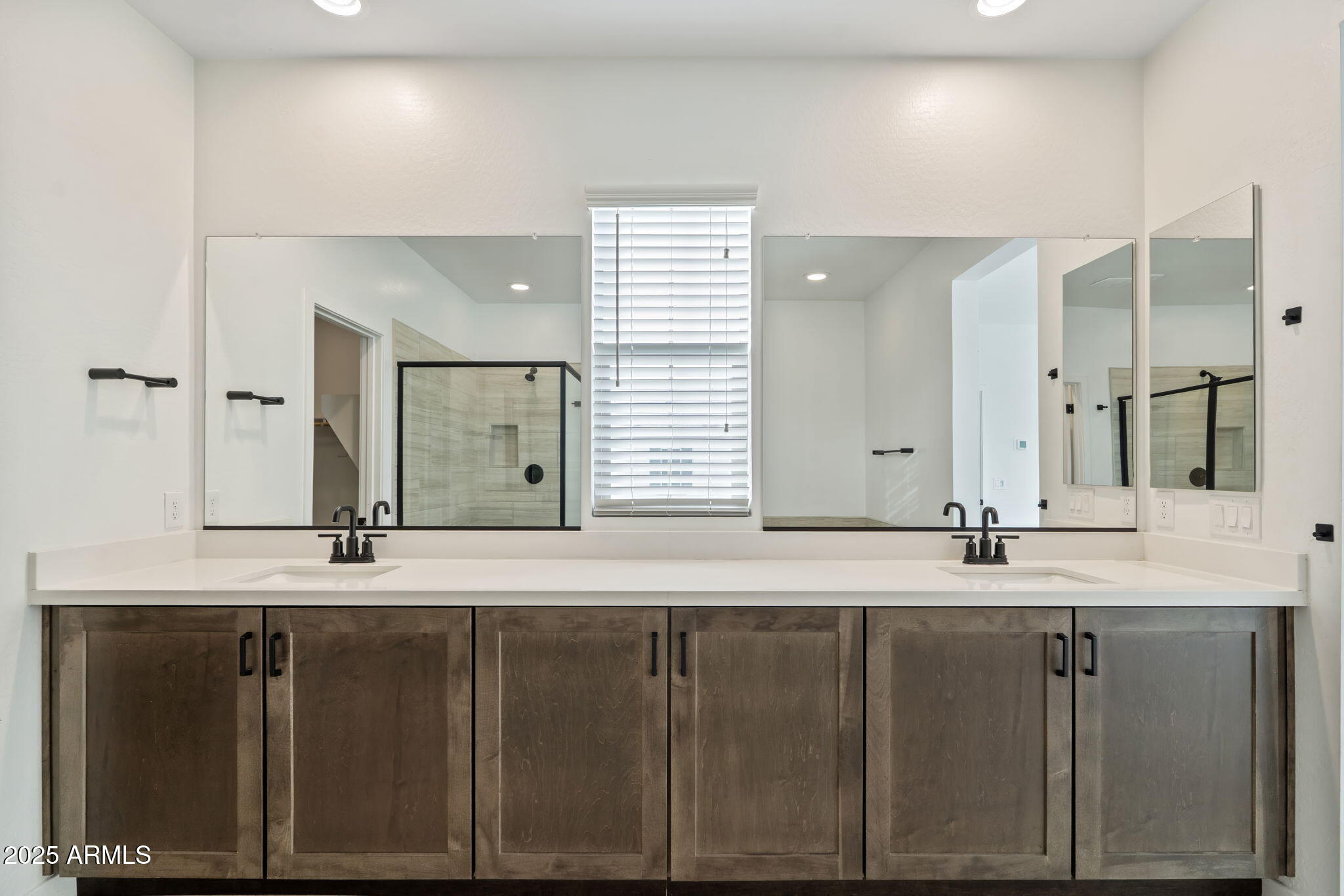 6428 North 17th Place Phoenix, AZ 85016 - Photo 29 of 48 a bathroom with a double vanity sink and a mirror