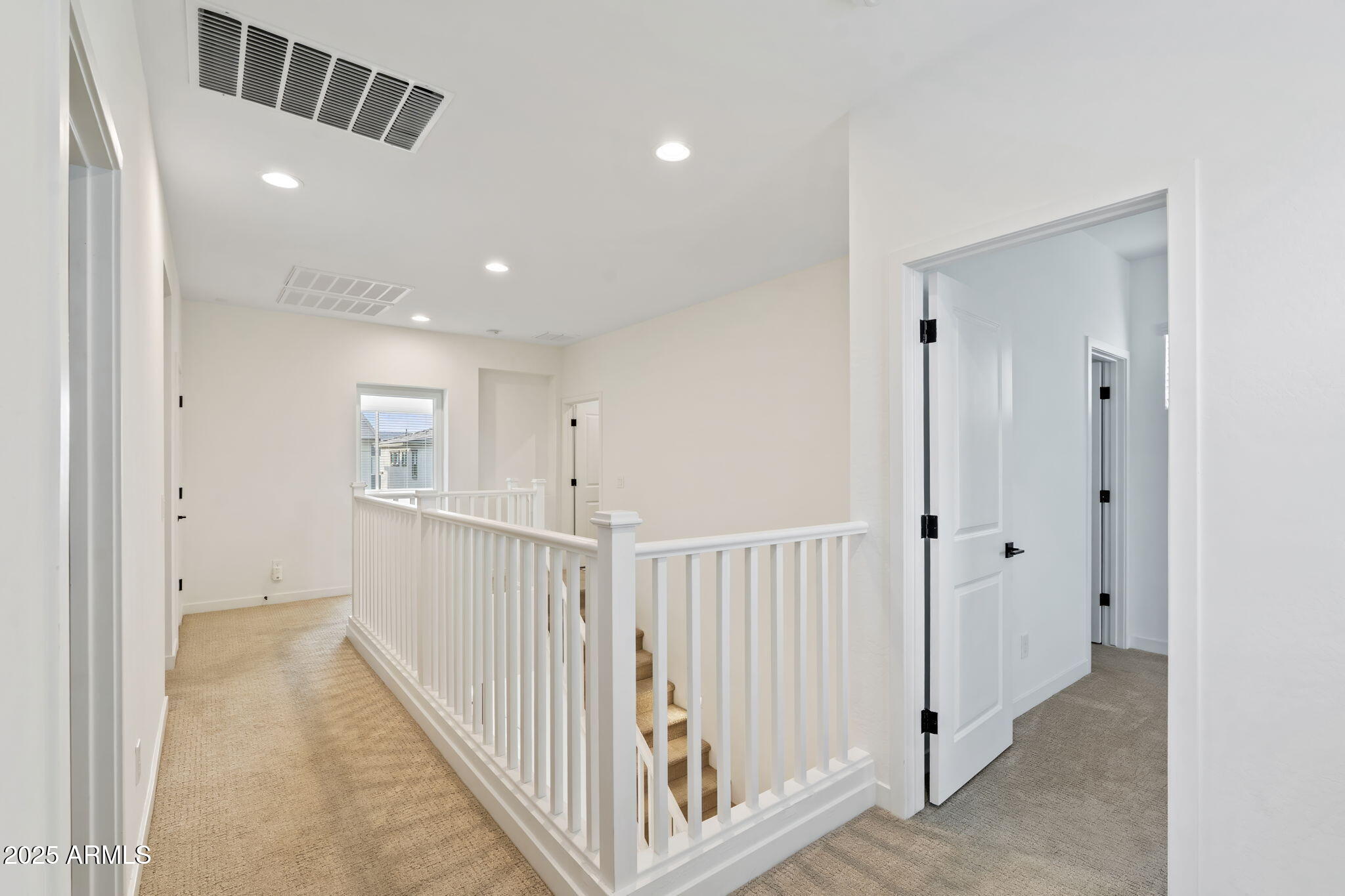 6428 North 17th Place Phoenix, AZ 85016 - Photo 47 of 48 a view of a hallway with white walls and entryway