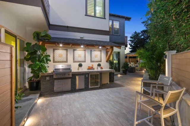 a view of a chairs and potted in the dinning room