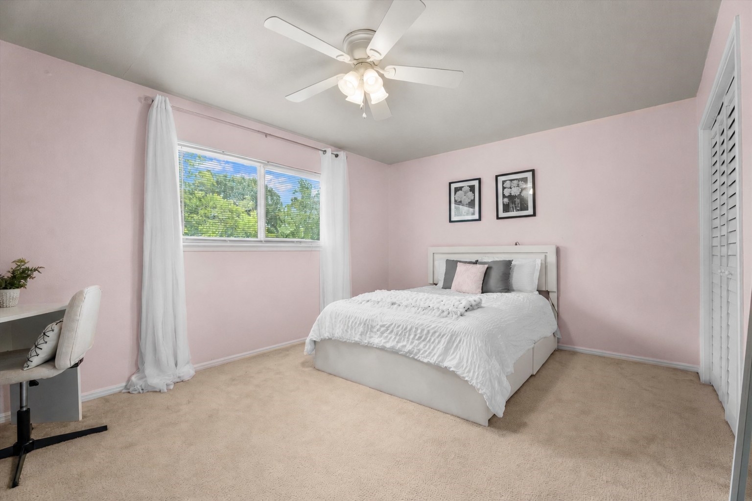 4026 Oxhill Road Spring, TX 77388 - Photo 27 of 40 Across the hall, this inviting secondary bedroom features soft natural light, a spacious layout, and a large closet.