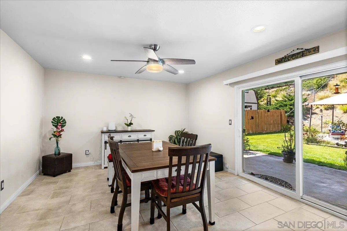 10738 2nd Street Santee, CA 92071 - Photo 12 of 52 a view of a dining room with furniture window and outside view