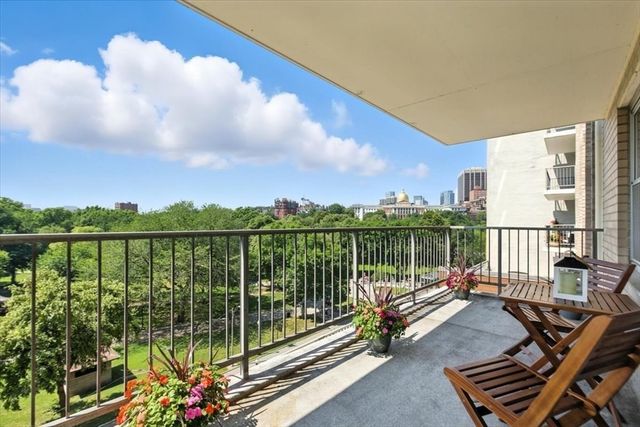 a view of a balcony with lake view