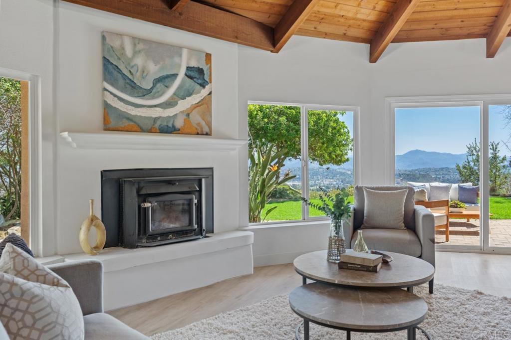 929 Cycad Drive San Marcos, CA 92078 - Photo 15 of 71 a living room with furniture and a fireplace