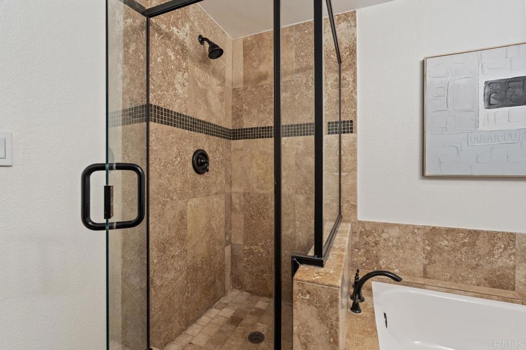 929 Cycad Drive San Marcos, CA 92078 - Photo 40 of 71 a bathroom with a shower