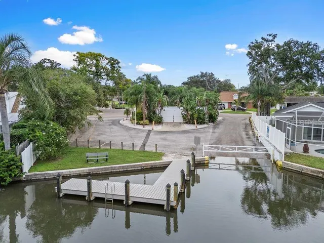 a view of a swimming pool with a patio