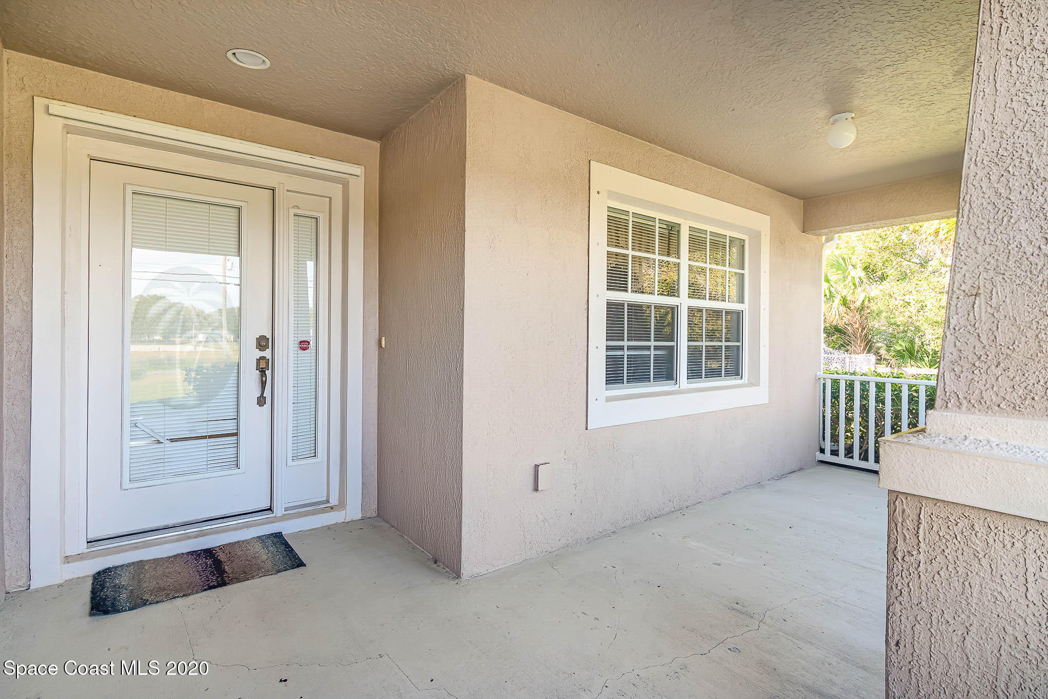 685 Hall Road Malabar, FL 32950 - Photo 3 of 35 an empty room with windows