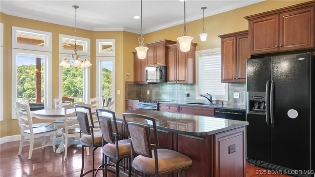 $785,000 | 402 Payne Stewart Court, Lake Ozark, MO 65049