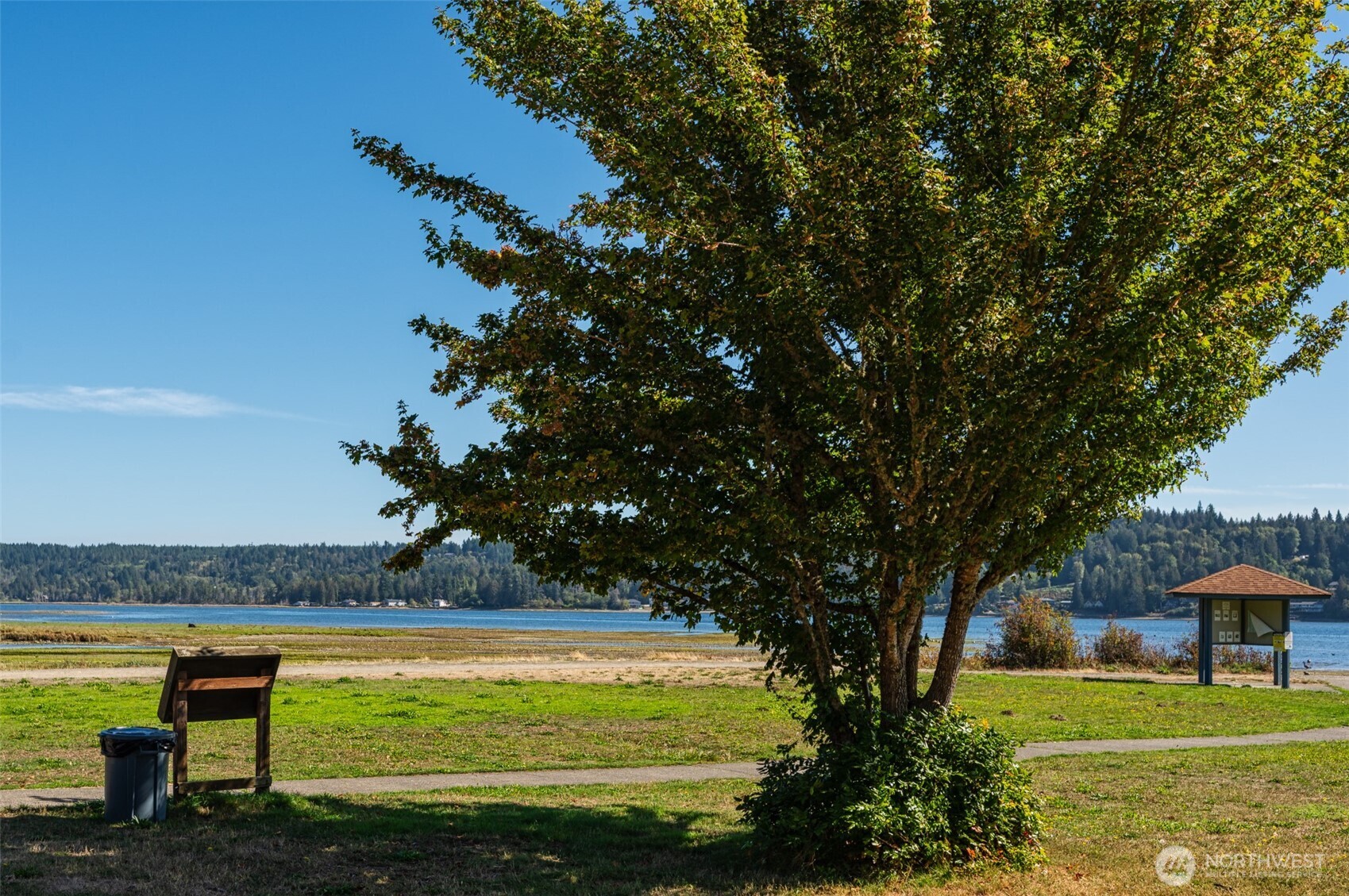 1671 Northeast Mission Creek Road Belfair, WA 98528 - Photo 28 of 31 a view of a swimming pool with a yard