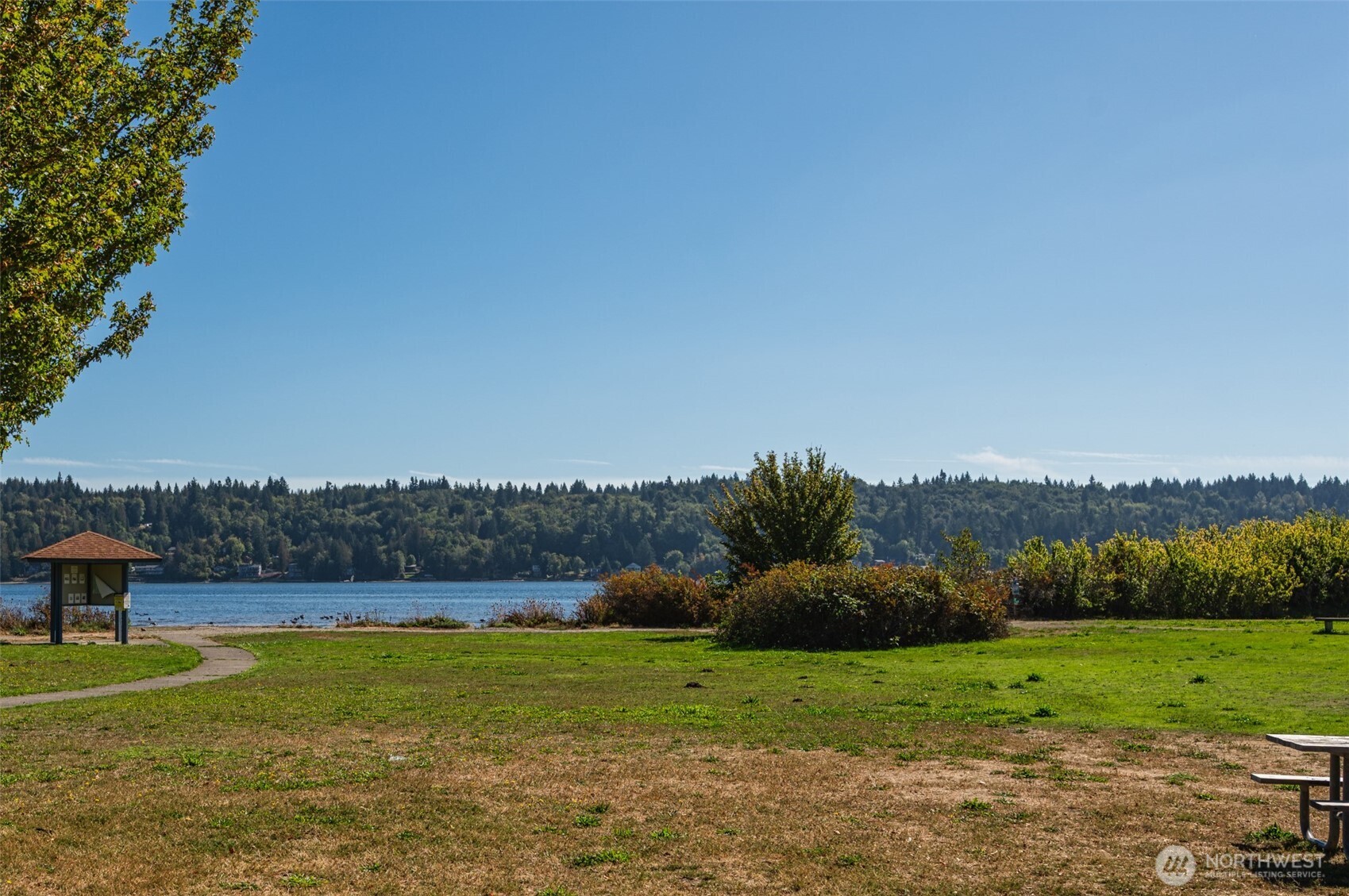 1671 Northeast Mission Creek Road Belfair, WA 98528 - Photo 31 of 31 a view of a big yard with a lake view