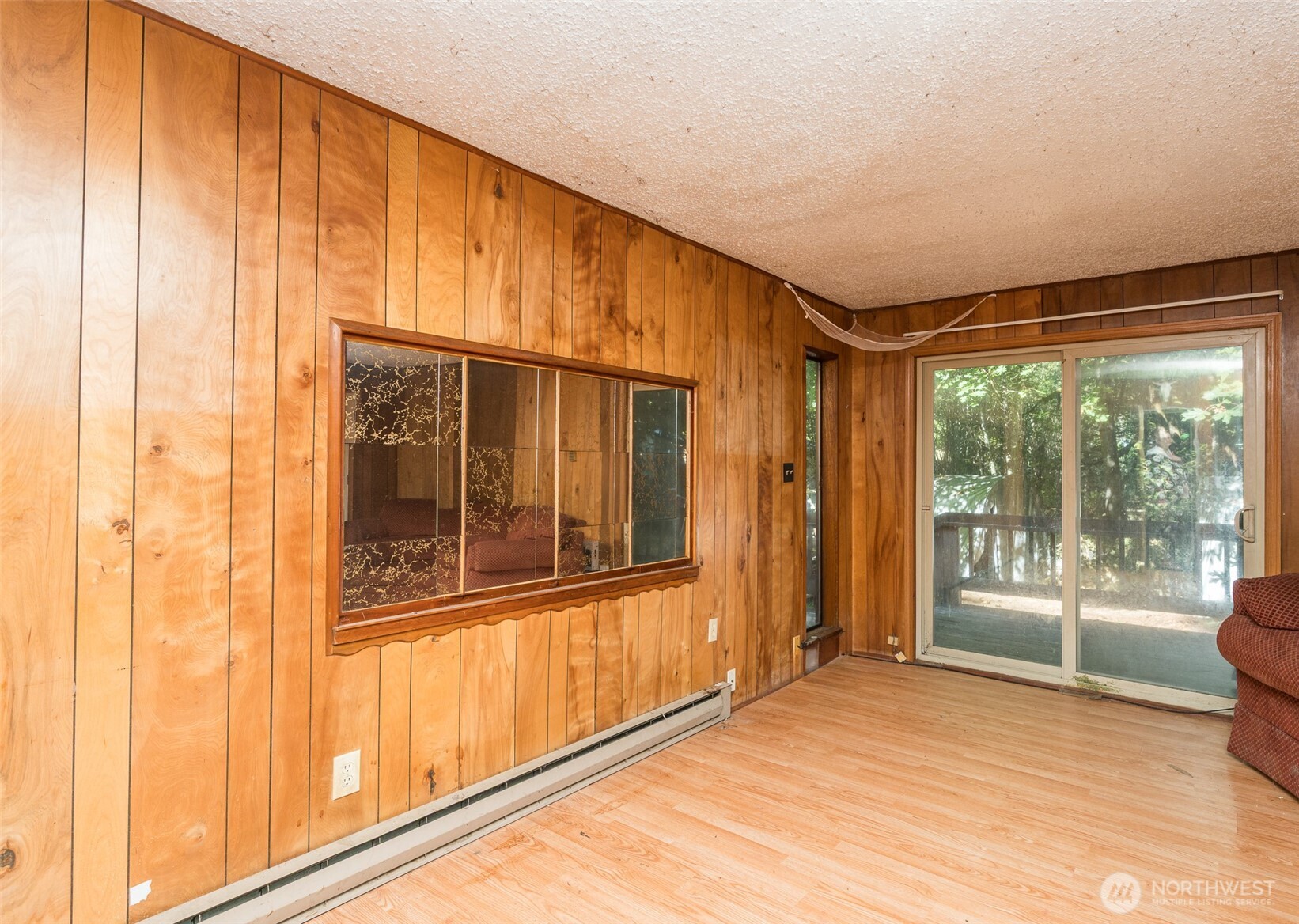 1671 Northeast Mission Creek Road Belfair, WA 98528 - Photo 8 of 31 a view of an empty room with a window