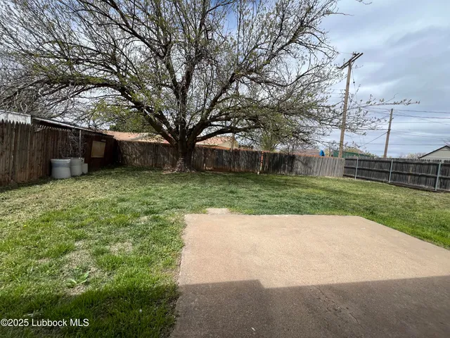a view of a backyard with a garden