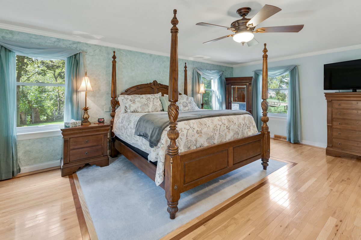 523 Aberdeen Road Frankfort, IL 60423 - Photo 14 of 23 a bedroom with a bed chandelier and a window
