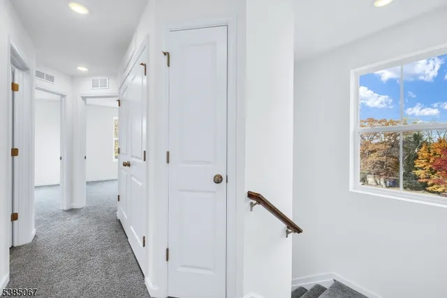 a view of a hallway with interior of a house