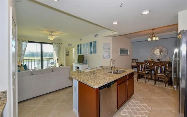 a living room with granite countertop furniture and a table