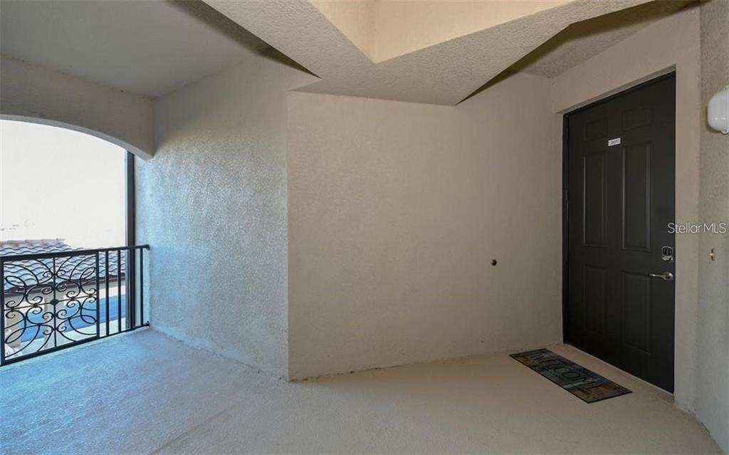 16904 Vardon Terrace, Unit 201 Lakewood Ranch, FL 34211 - Photo 2 of 35 a view of an empty room