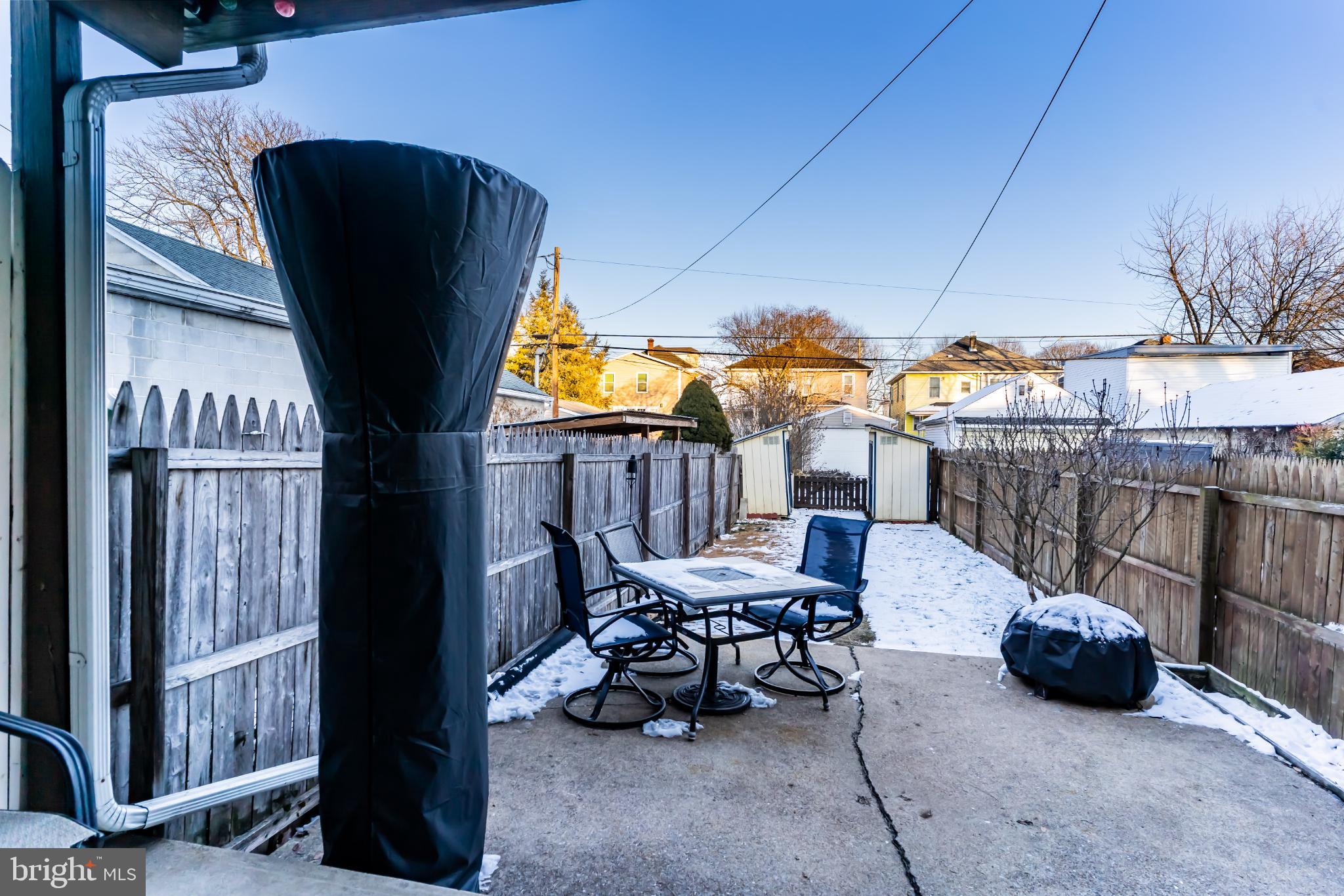 417 Arch Street Carlisle, PA 17013 - Photo 21 of 28 Back yard - paved patio, fenced yard, & sheds