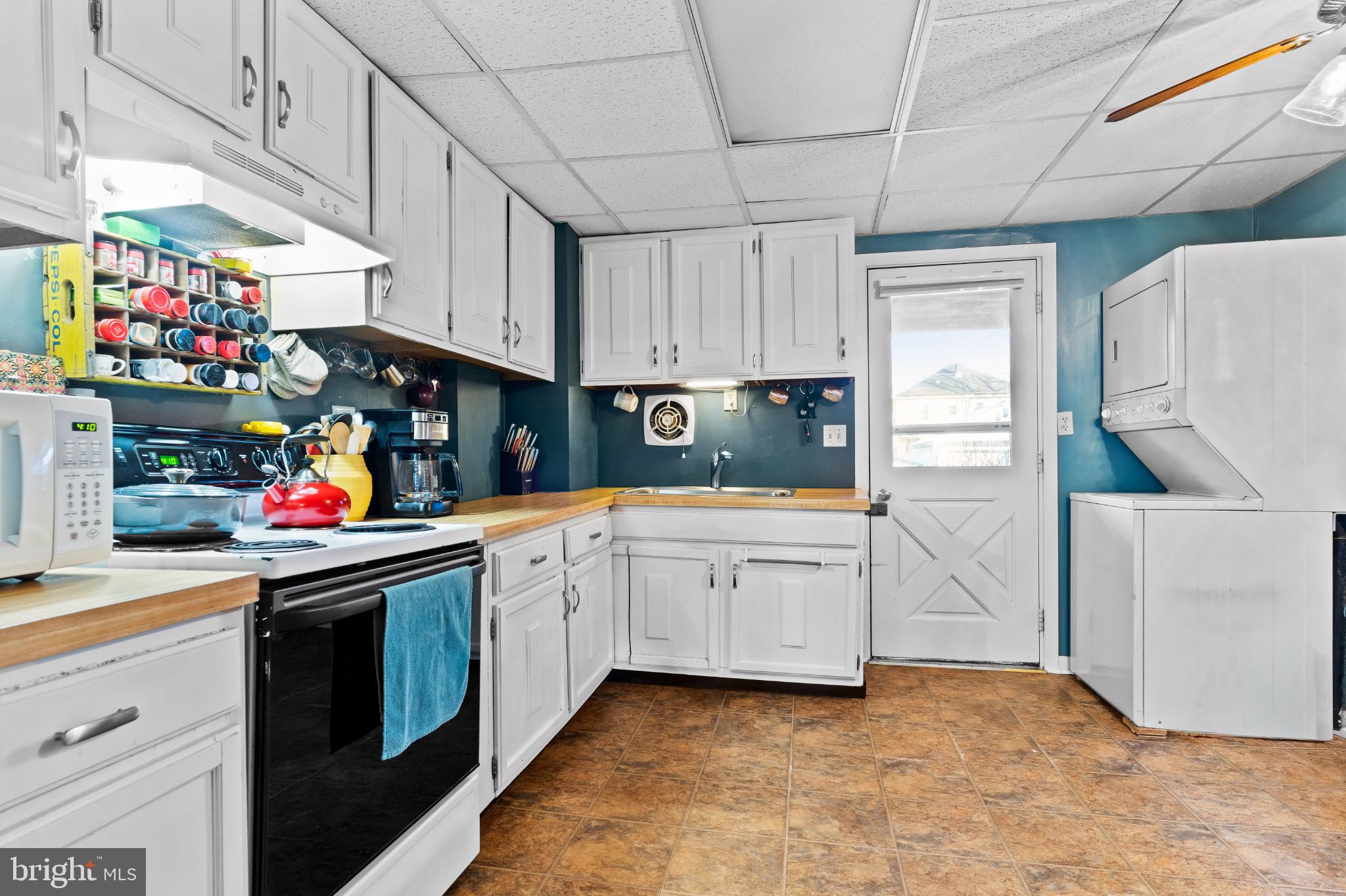 417 Arch Street Carlisle, PA 17013 - Photo 10 of 28 Kitchen and back door to patio and fenced yard.