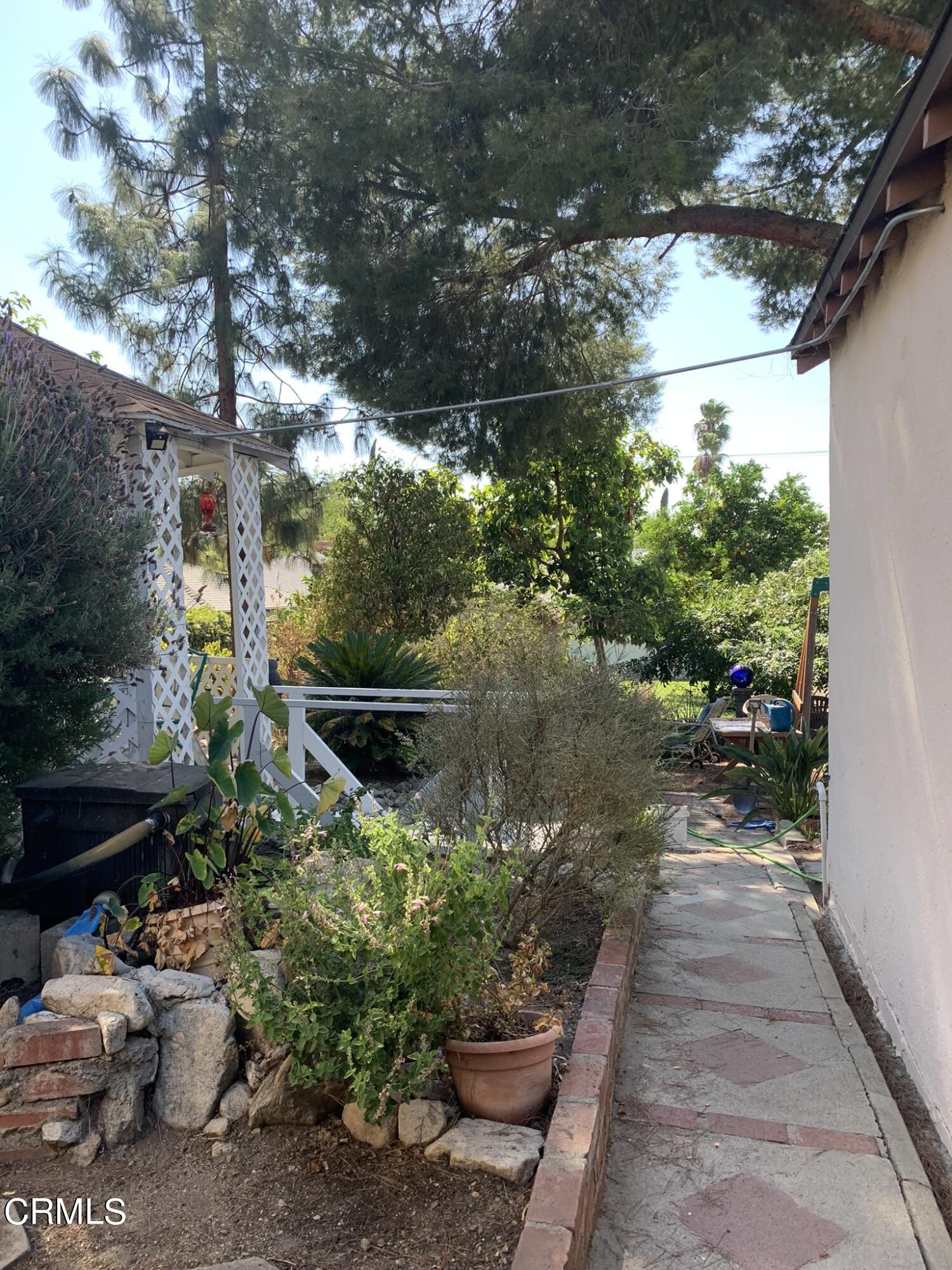 10651 Tinker Avenue Tujunga, CA 91042 - Photo 10 of 13 a backyard of a house with lots of green space