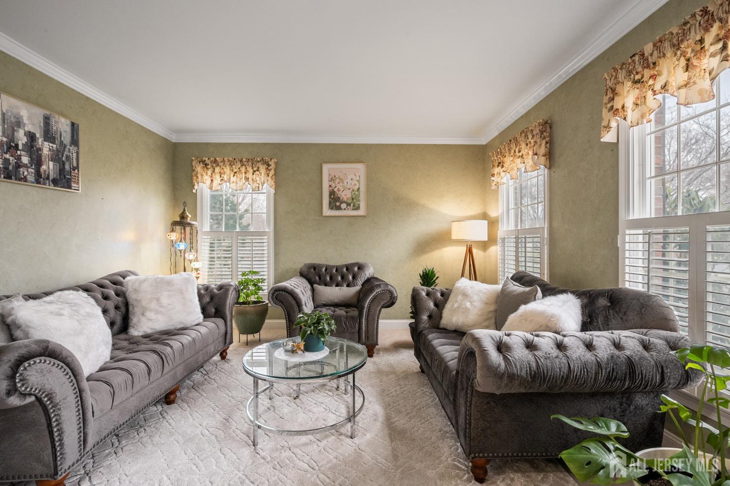 3 Milburne Lane Robbinsville, NJ 08691 - Photo 20 of 50 a living room with furniture and a large window