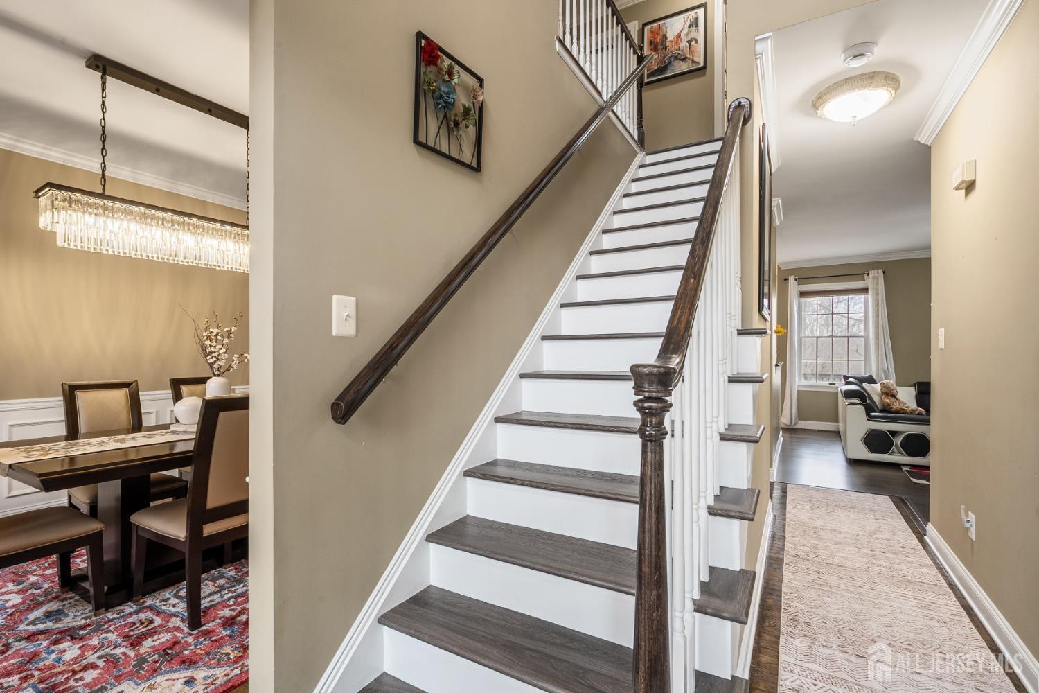 3 Milburne Lane Robbinsville, NJ 08691 - Photo 22 of 50 a view of a hallway with furniture and staircase