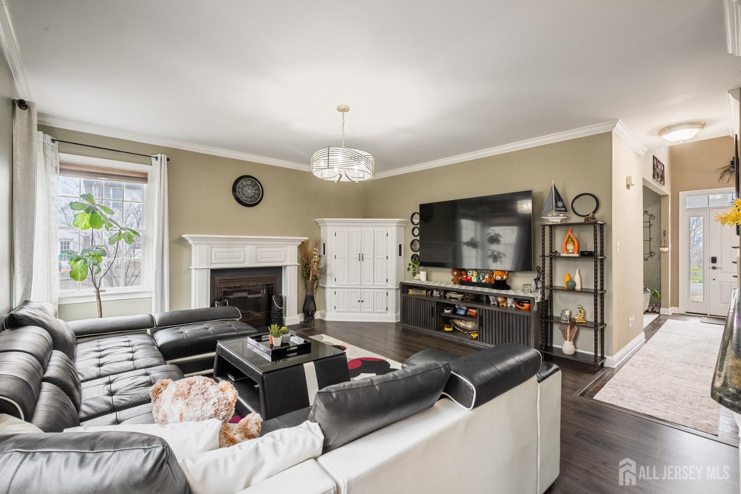 3 Milburne Lane Robbinsville, NJ 08691 - Photo 25 of 50 a living room with furniture and a flat screen tv