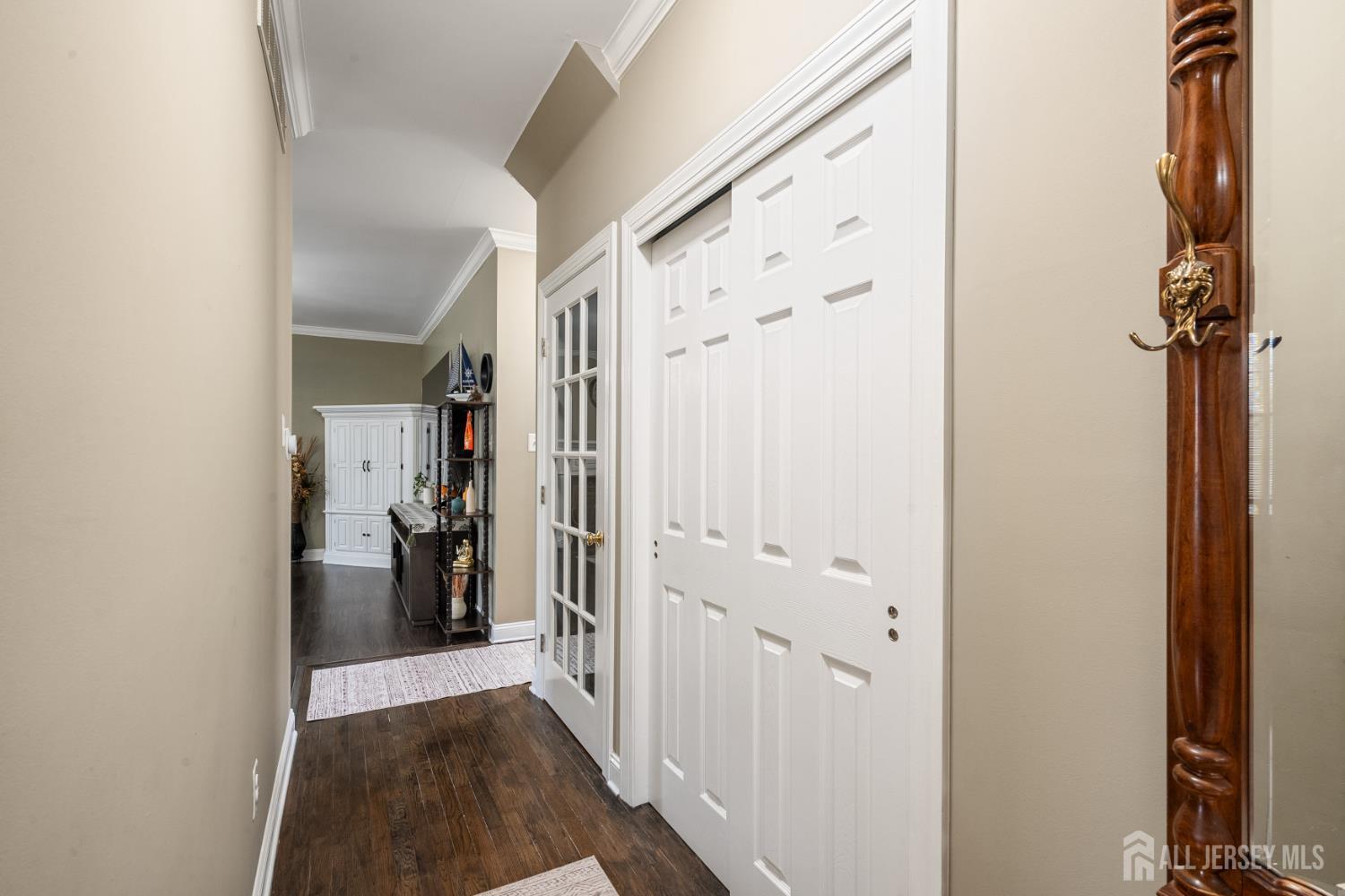 3 Milburne Lane Robbinsville, NJ 08691 - Photo 32 of 50 a view of a hallway with closet and a couch