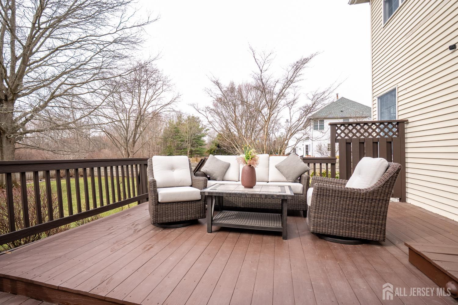 3 Milburne Lane Robbinsville, NJ 08691 - Photo 4 of 50 a view of a patio with two chairs and wooden floor