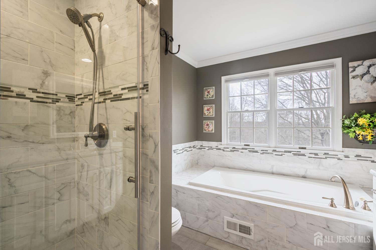 3 Milburne Lane Robbinsville, NJ 08691 - Photo 45 of 50 a bath tub sitting next to a window