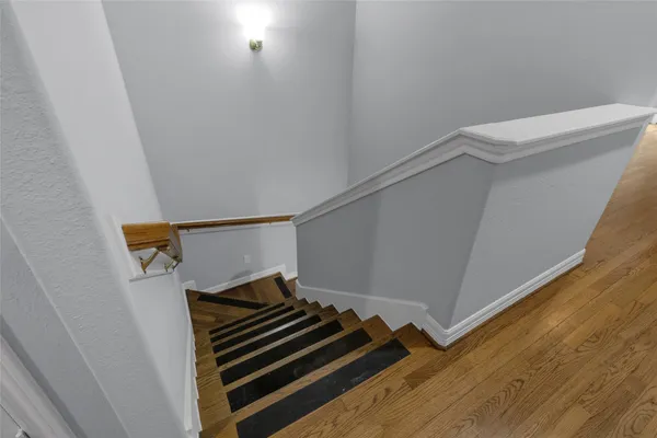 a view of entryway with wooden floor