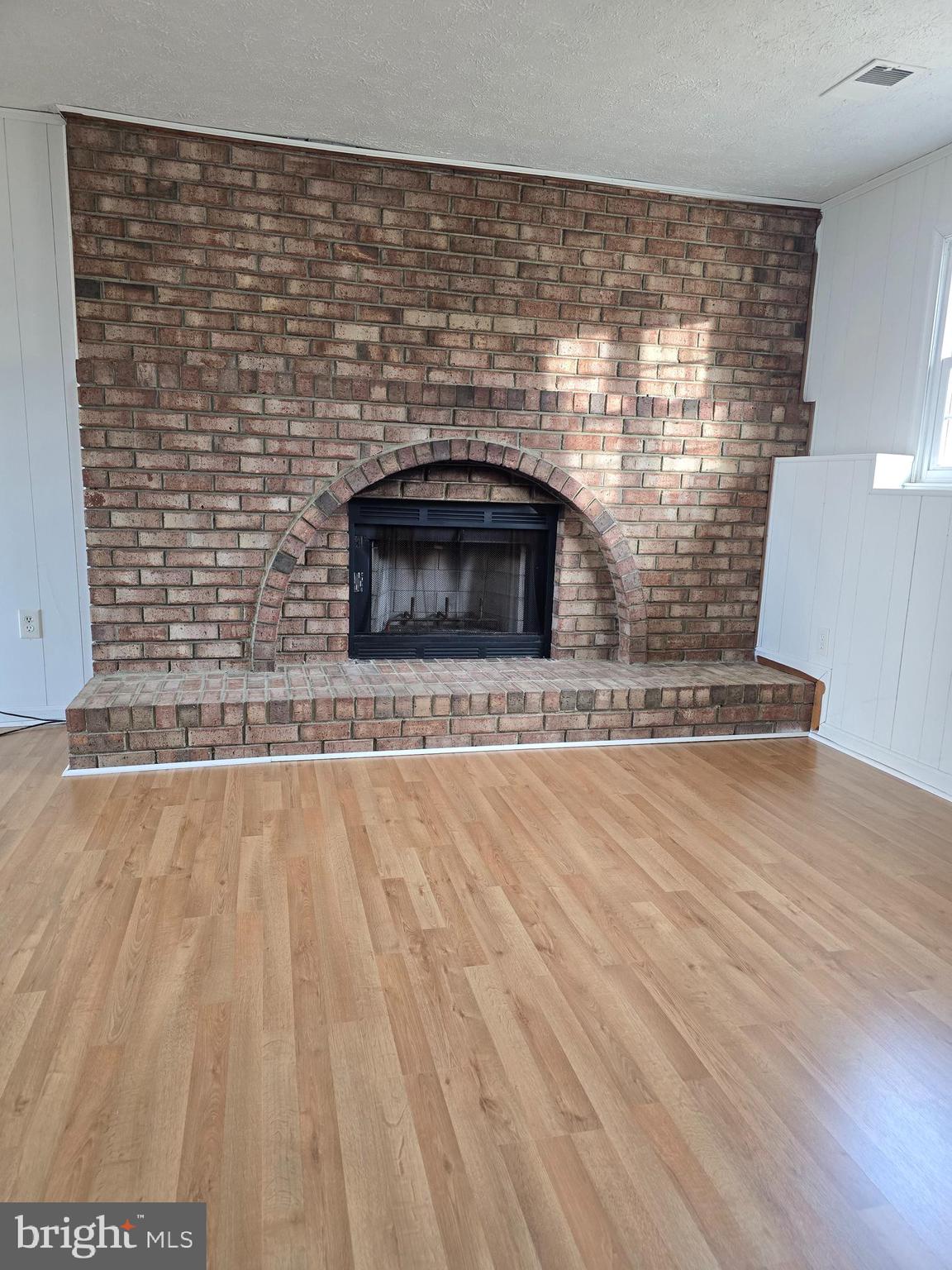 8907 Chad Way Clinton, MD 20735 - Photo 18 of 48 a living room with a wooden floor