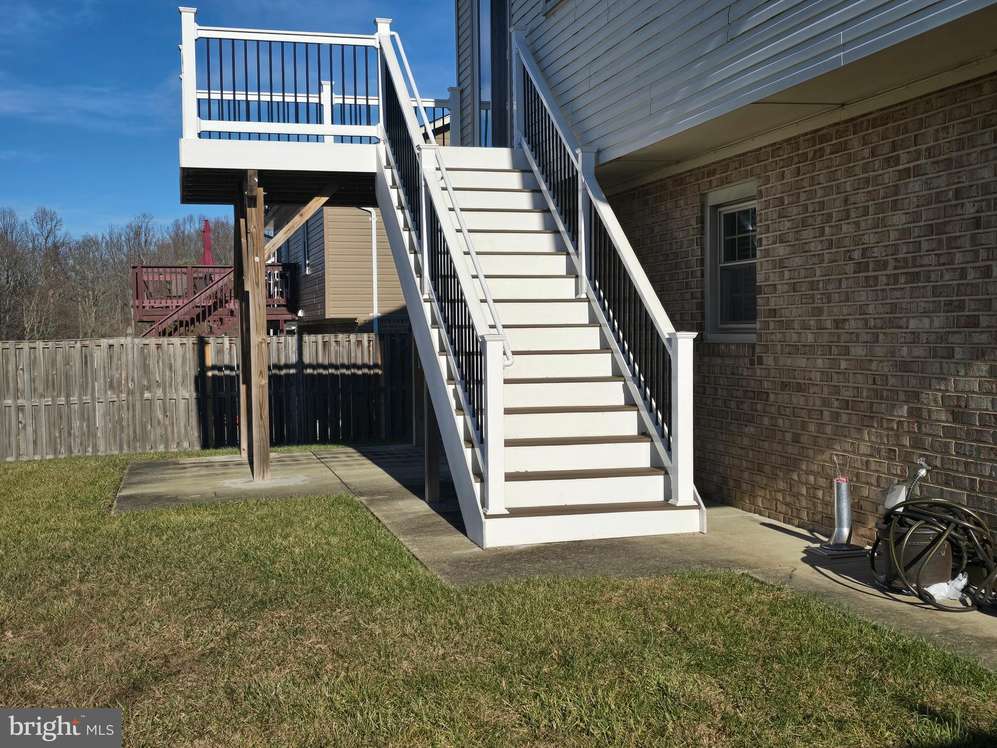 8907 Chad Way Clinton, MD 20735 - Photo 31 of 48 a view of a house with backyard and deck