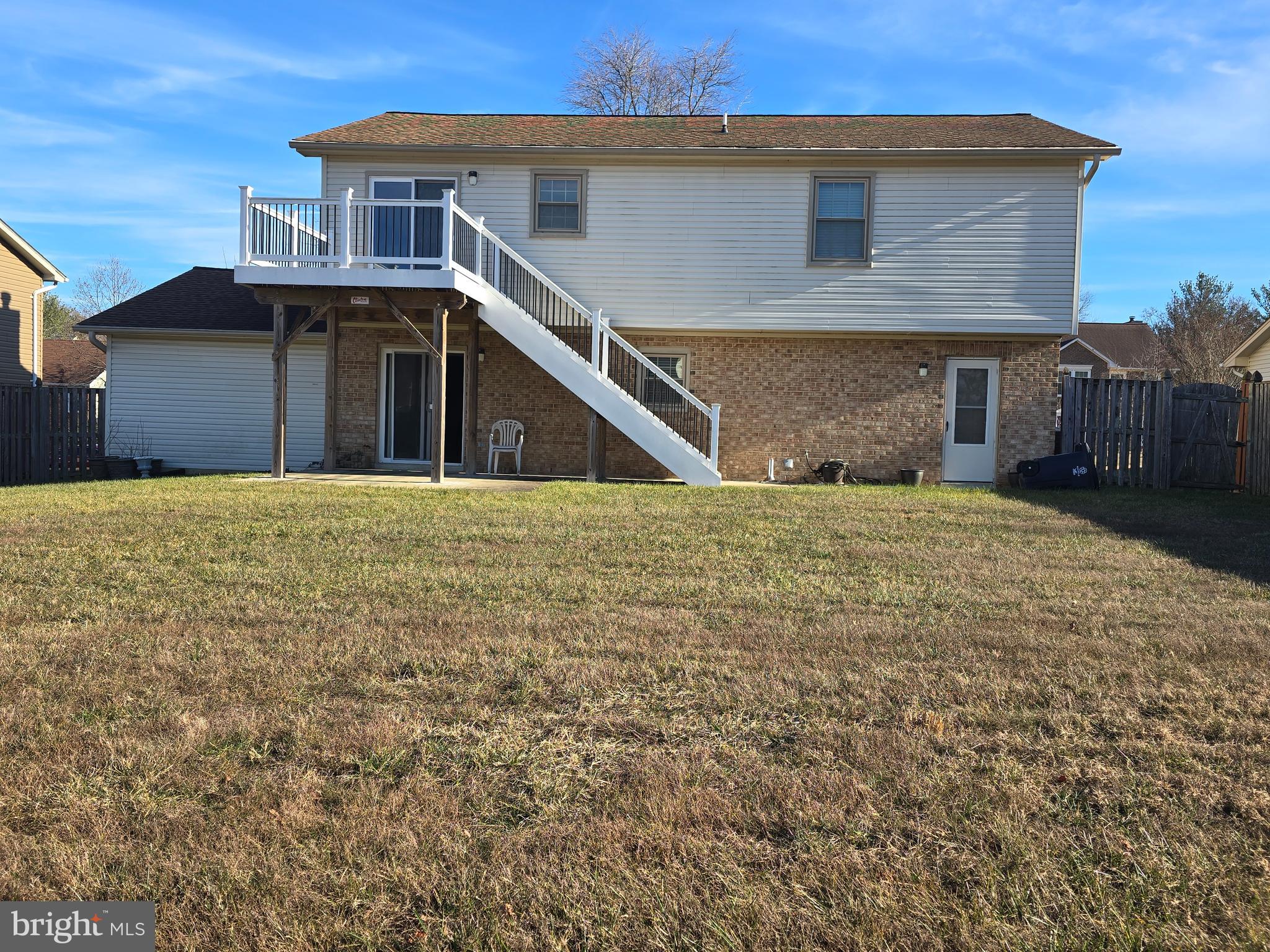 8907 Chad Way Clinton, MD 20735 - Photo 32 of 48 a front view of a house with a yard