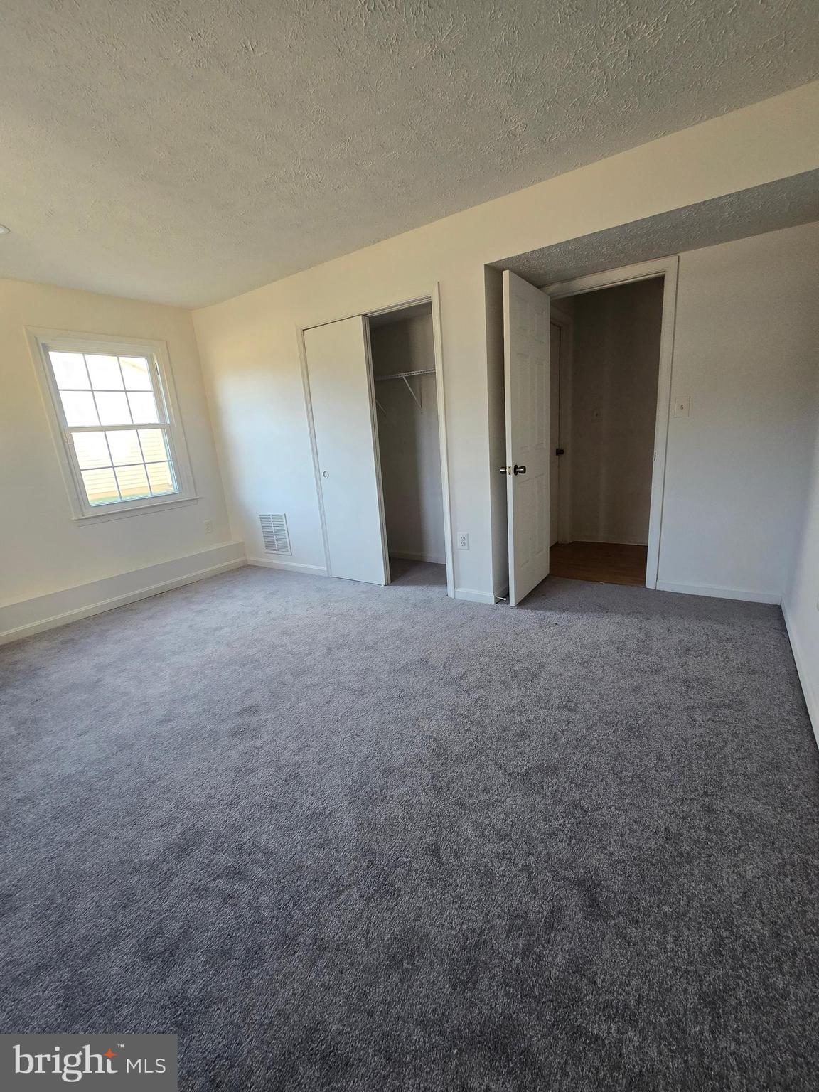8907 Chad Way Clinton, MD 20735 - Photo 44 of 48 a view of empty room with windows