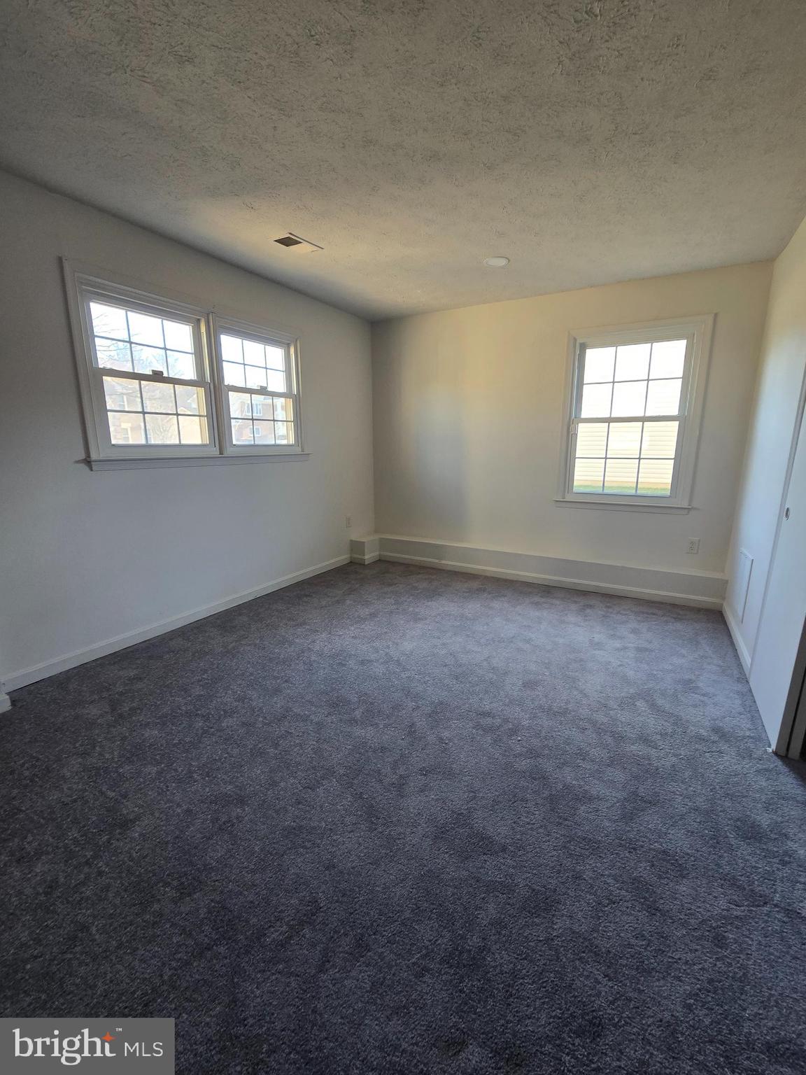 8907 Chad Way Clinton, MD 20735 - Photo 10 of 48 an empty room with a window