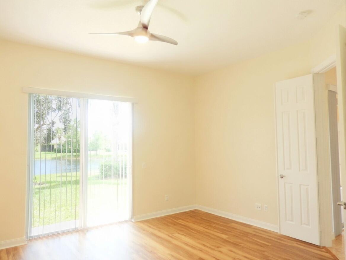 11547 Southwest Rockingham Drive Port St. Lucie, FL 34987 - Photo 13 of 45 Primary Bedroom grok