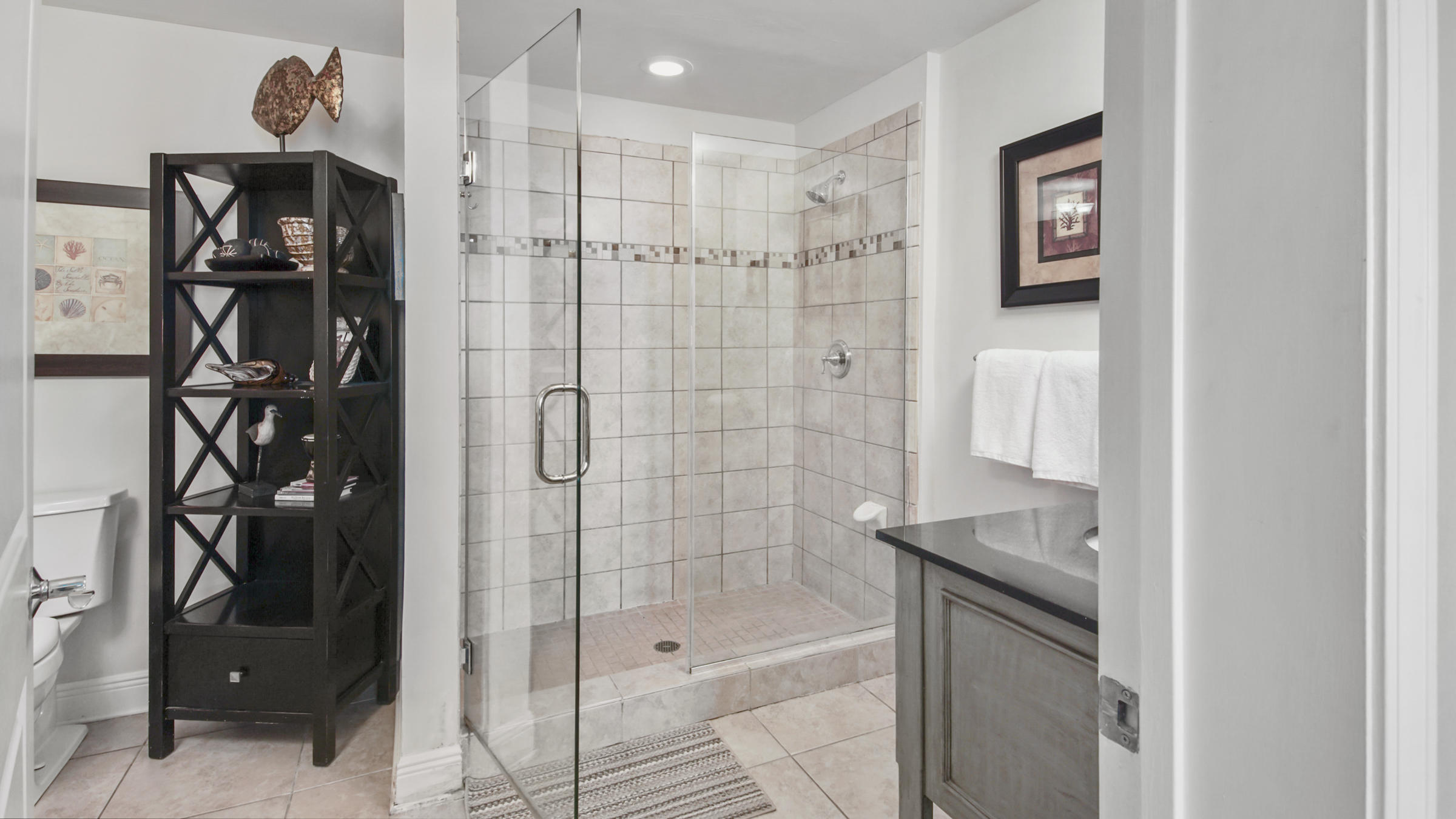 16701 Front Beach Road, Unit 1502 Panama City Beach, FL 32413 - Photo 14 of 33 a bathroom with a shower