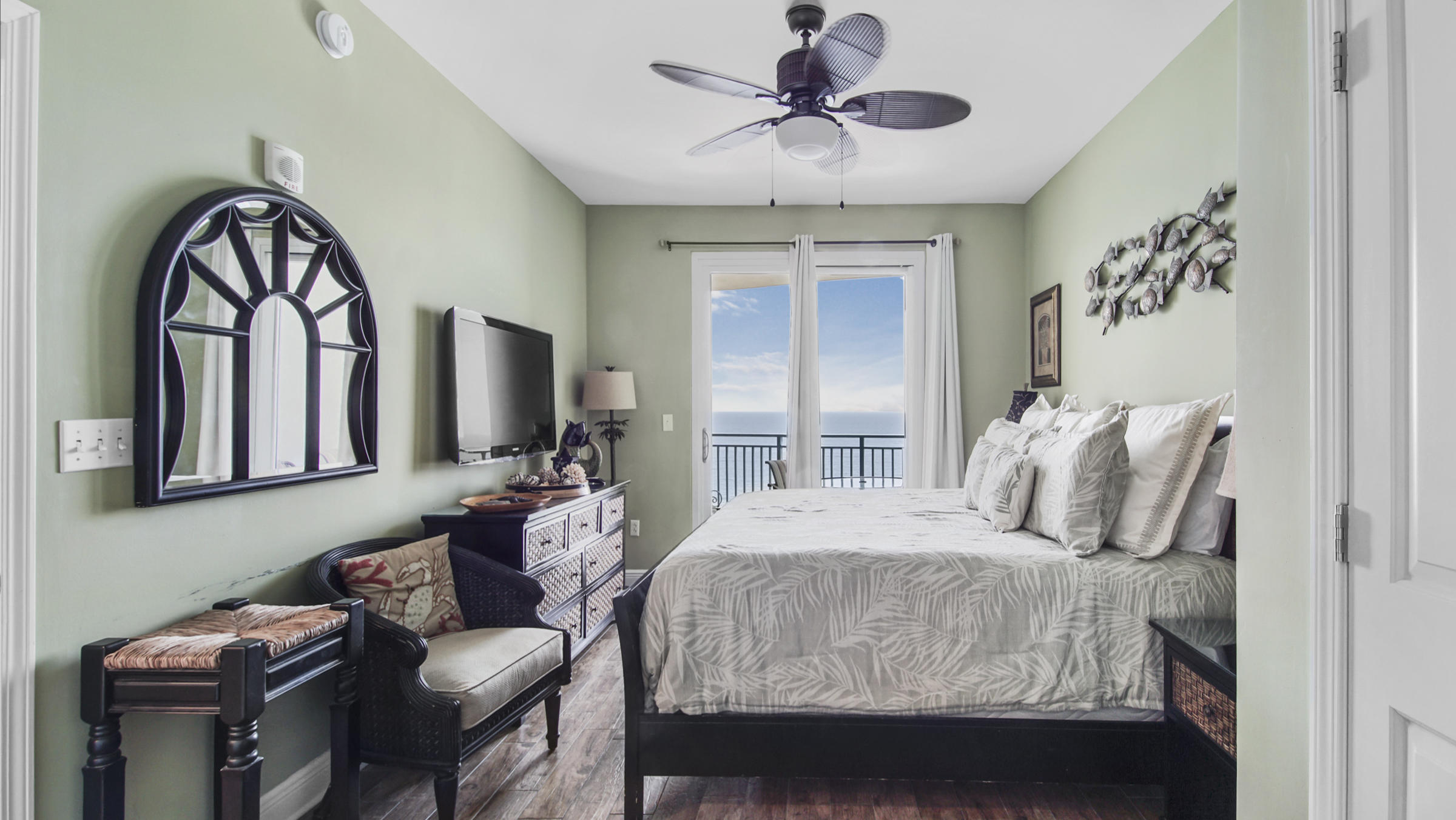 16701 Front Beach Road, Unit 1502 Panama City Beach, FL 32413 - Photo 8 of 33 a bedroom with a bed window and couch
