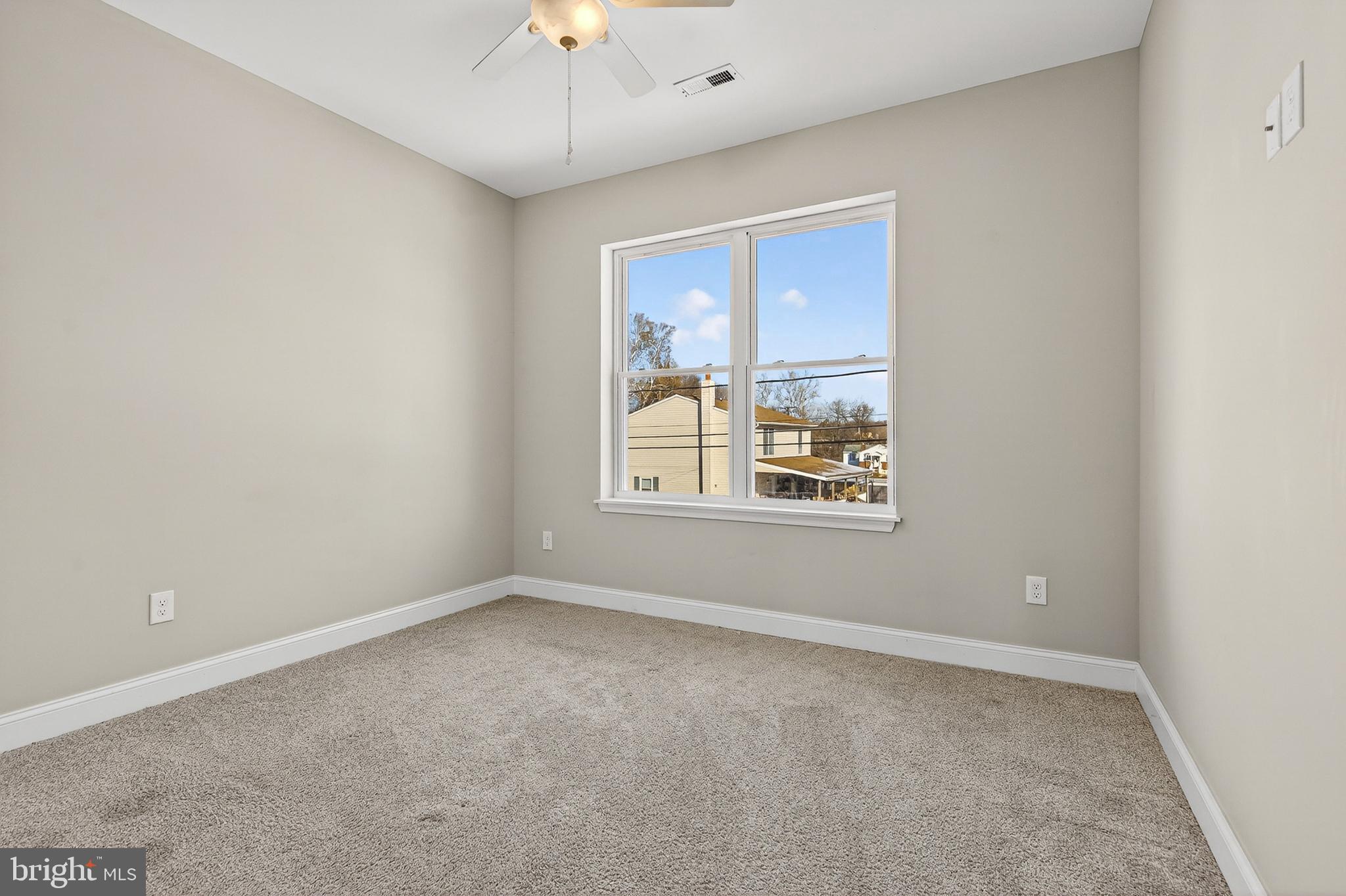 511 Patuxent Avenue Rosedale, MD 21237 - Photo 28 of 51 a view of an empty room with a window