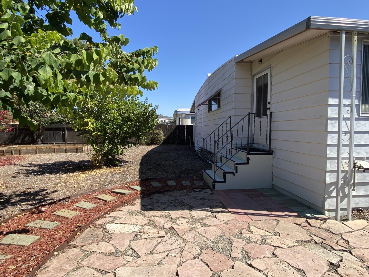 1220 Tasman Drive, Unit 159 Sunnyvale, CA 94089 - Photo 13 of 46 a view of a house with a yard
