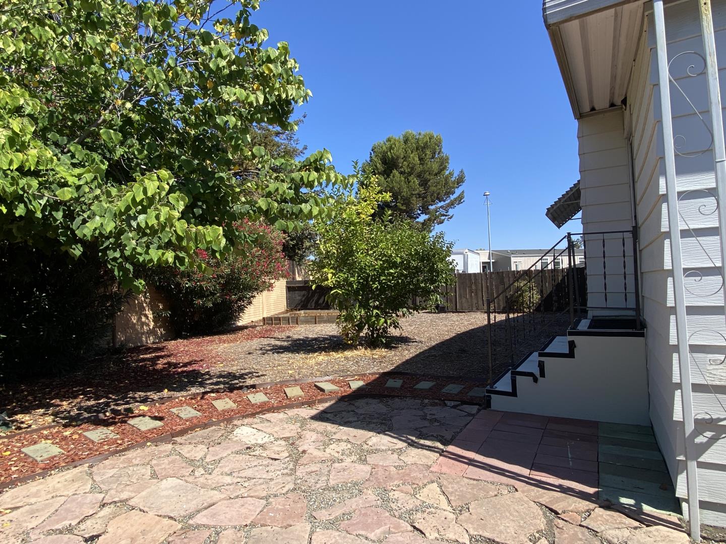 1220 Tasman Drive, Unit 159 Sunnyvale, CA 94089 - Photo 18 of 46 a view of a street with some trees in the background