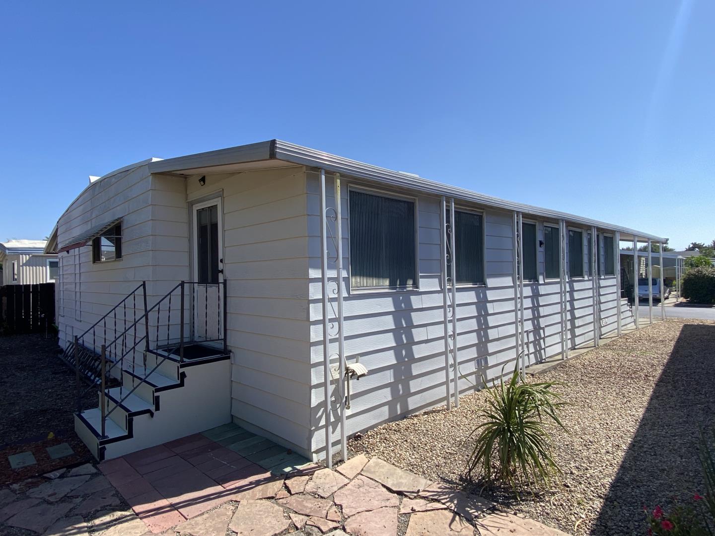 1220 Tasman Drive, Unit 159 Sunnyvale, CA 94089 - Photo 19 of 46 a view of a house with wooden fence