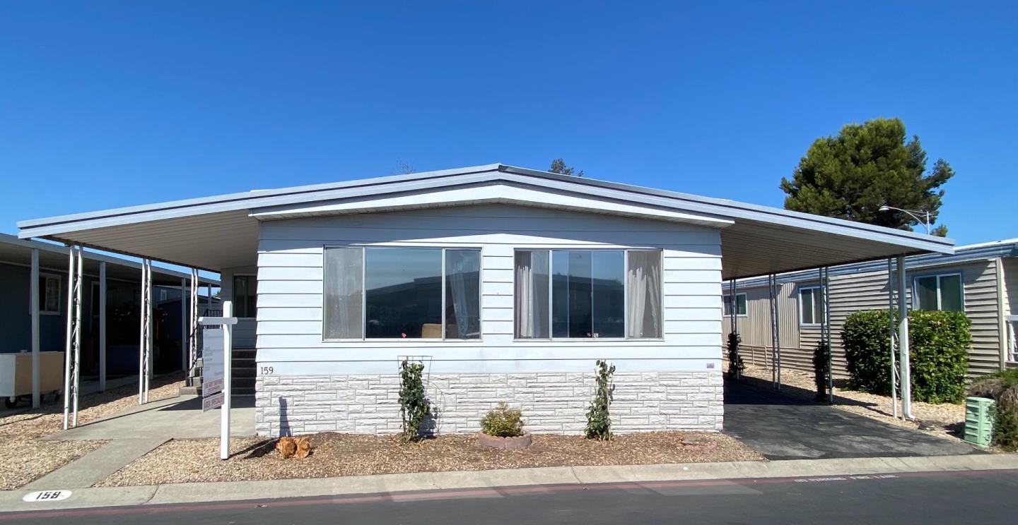 1220 Tasman Drive, Unit 159 Sunnyvale, CA 94089 - Photo 25 of 46 a front view of a house with a garage