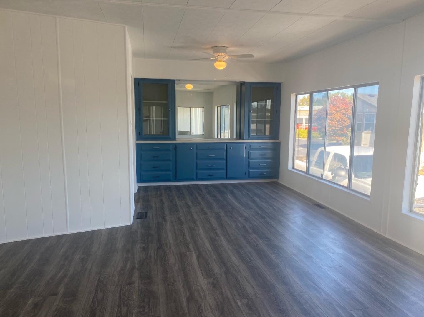 1220 Tasman Drive, Unit 159 Sunnyvale, CA 94089 - Photo 5 of 46 wooden floor in an empty room with a window