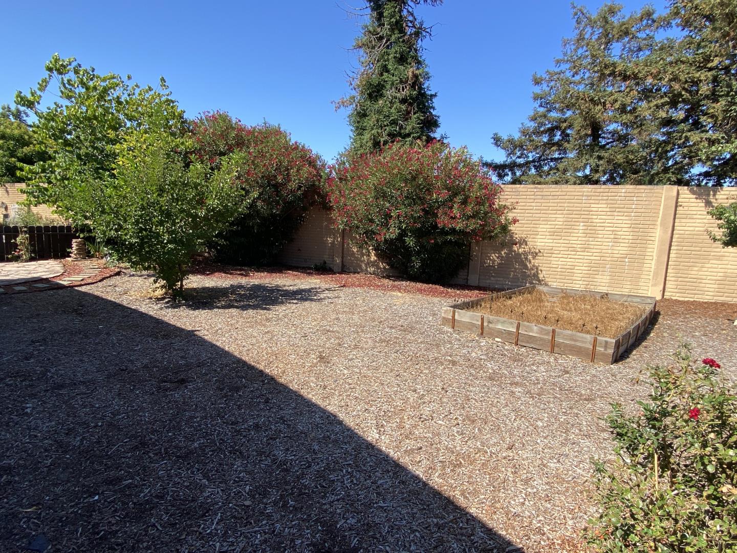 1220 Tasman Drive, Unit 159 Sunnyvale, CA 94089 - Photo 9 of 46 a view of wooden fence and trees