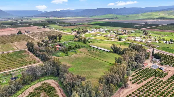 a view of a city with an ocean view